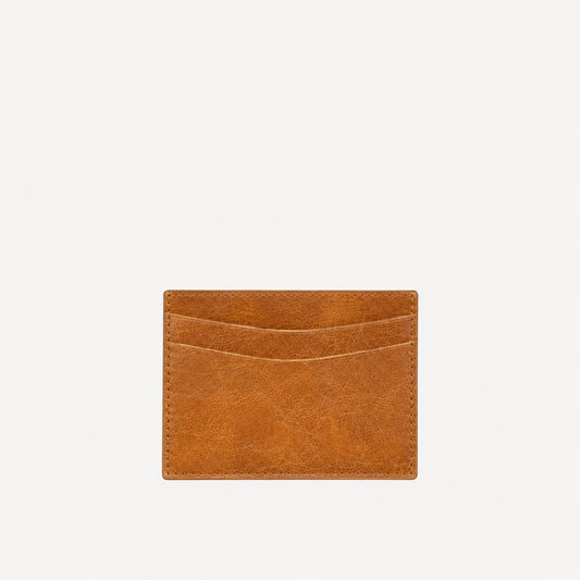 PaulyJen distressed cognac Italian leather card holder with a slim rectangular design